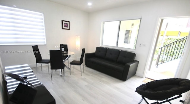 251 NW 57th Ave, Miami, FL 33126 - living area with light wood-style flooring, baseboards, and recessed lighting
