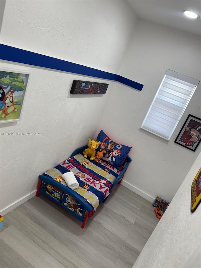 251 NW 57th Ave, Miami, FL 33126 - bedroom featuring wood finished floors and baseboards
