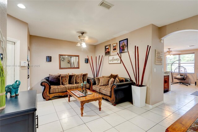 1100 SE 19th Ave, Homestead, FL 33035 - living area with a ceiling fan, arched walkways, light tile patterned floors, and recessed lighting