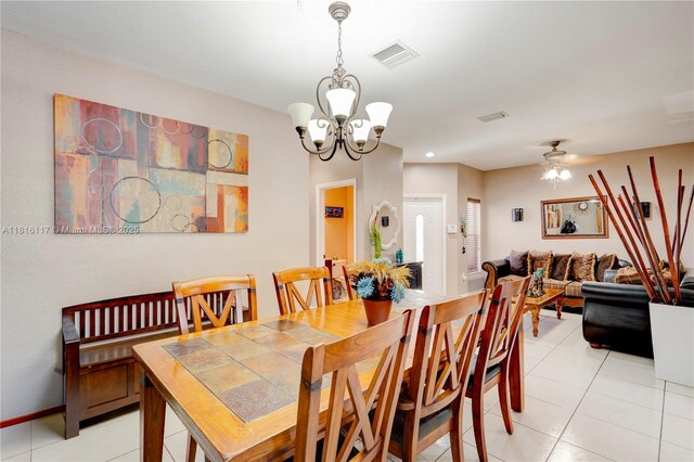 1100 SE 19th Ave, Homestead, FL 33035 - dining room with a chandelier, light tile patterned floors, a ceiling fan, and recessed lighting