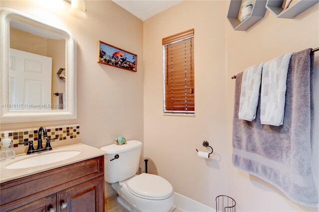 1100 SE 19th Ave, Homestead, FL 33035 - bathroom featuring backsplash and vanity