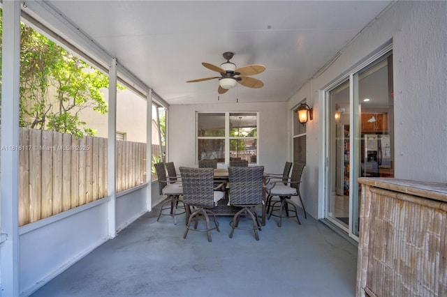 1100 SE 19th Ave, Homestead, FL 33035 - sunroom with a ceiling fan and outdoor dining space