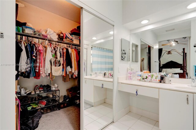 1100 SE 19th Ave, Homestead, FL 33035 - full bath featuring tile patterned floors, vanity, a walk in closet, ceiling fan, and recessed lighting