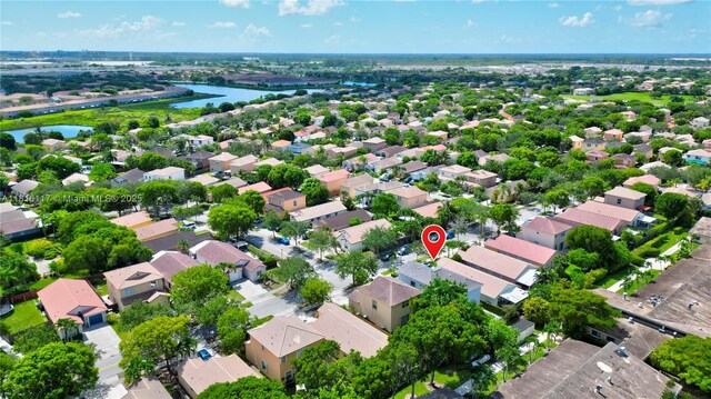 1100 SE 19th Ave, Homestead, FL 33035 - aerial perspective of suburban area featuring a large body of water