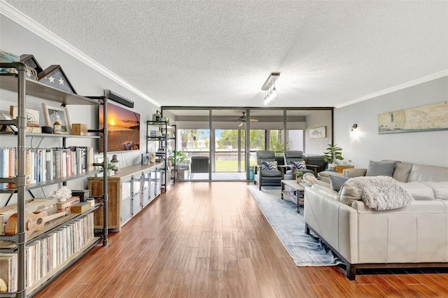 1100 SE 5th Ct Unit 87, Pompano Beach, FL 33060 - living room featuring crown molding, a textured ceiling, wood finished floors, and french doors