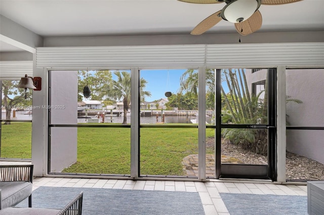 1100 SE 5th Ct Unit 87, Pompano Beach, FL 33060 - unfurnished sunroom with a water view and ceiling fan