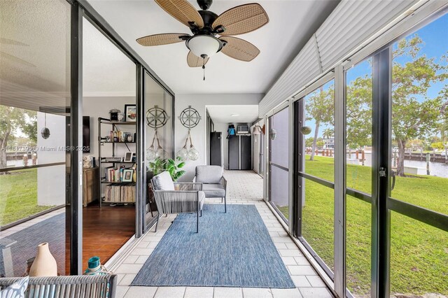 1100 SE 5th Ct Unit 87, Pompano Beach, FL 33060 - sunroom / solarium featuring a water view and a ceiling fan