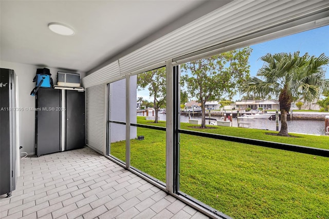 1100 SE 5th Ct Unit 87, Pompano Beach, FL 33060 - unfurnished sunroom featuring a water view