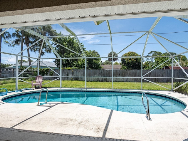 508 Arcadia Ave NE, Palm Bay, FL 32907 - view of swimming pool featuring a patio and glass enclosure