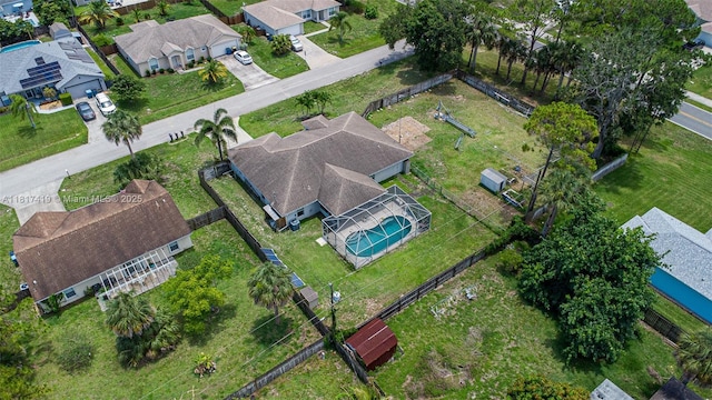508 Arcadia Ave NE, Palm Bay, FL 32907 - aerial overview of property's location with nearby suburban area and a pool area