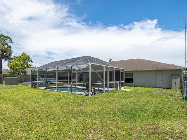 508 Arcadia Ave NE, Palm Bay, FL 32907 - rear view of house with a yard and an outdoor pool