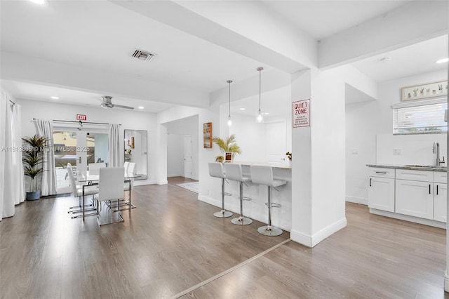 1013 S 24th Ave, Hollywood, FL 33020 - dining area with light wood-style floors, recessed lighting, baseboards, and ceiling fan