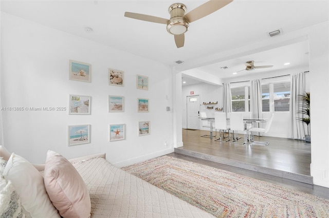 1013 S 24th Ave, Hollywood, FL 33020 - living room with ceiling fan, wood finished floors, baseboards, and recessed lighting