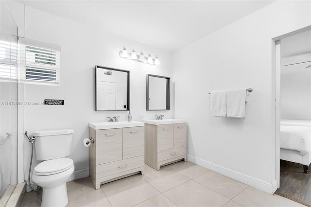 1013 S 24th Ave, Hollywood, FL 33020 - ensuite bathroom featuring vanity, baseboards, toilet, and a shower with door