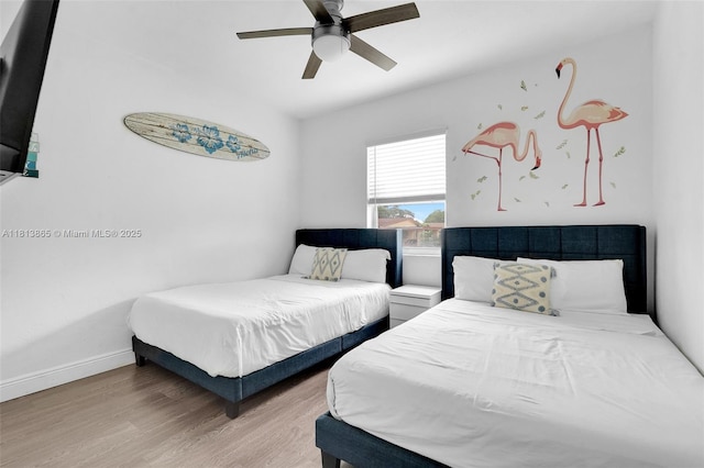 1013 S 24th Ave, Hollywood, FL 33020 - bedroom with wood finished floors, ceiling fan, and baseboards