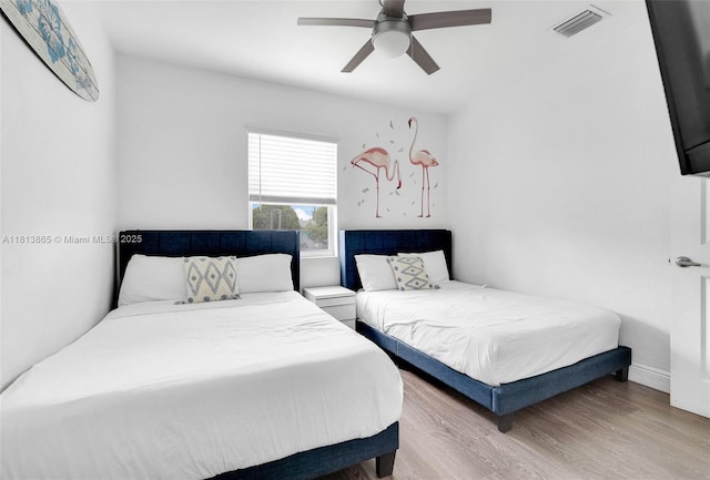 1013 S 24th Ave, Hollywood, FL 33020 - bedroom with wood finished floors, a ceiling fan, and baseboards