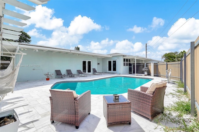 1013 S 24th Ave, Hollywood, FL 33020 - view of pool with a patio, a fenced backyard, and french doors