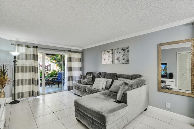 14001 SW 91st Ter Unit 14001, Miami, FL 33186 - living room featuring crown molding, a textured ceiling, light tile patterned flooring, and baseboards