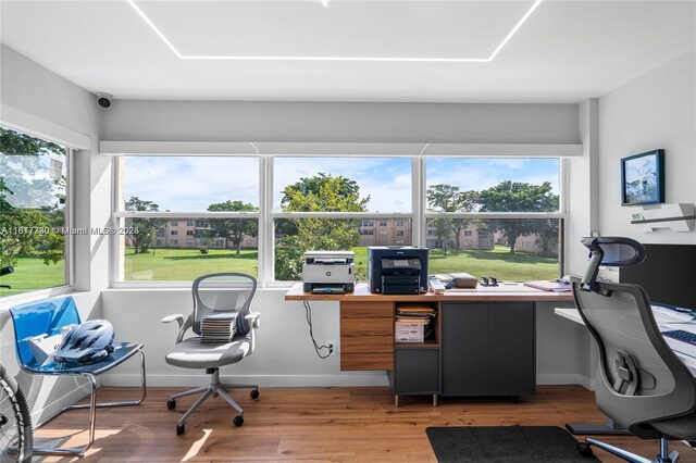9310 Sunrise Lakes Blvd Unit 206, Sunrise, FL 33322 - office with light wood-style floors, healthy amount of natural light, and baseboards