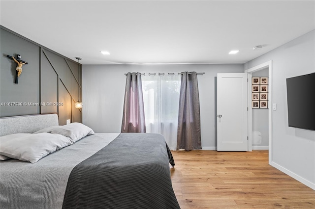 9310 Sunrise Lakes Blvd Unit 206, Sunrise, FL 33322 - bedroom featuring light wood-style floors, baseboards, and recessed lighting