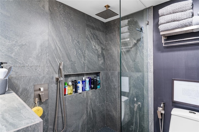 9310 Sunrise Lakes Blvd Unit 206, Sunrise, FL 33322 - full bath with a marble finish shower, toilet, and tile walls