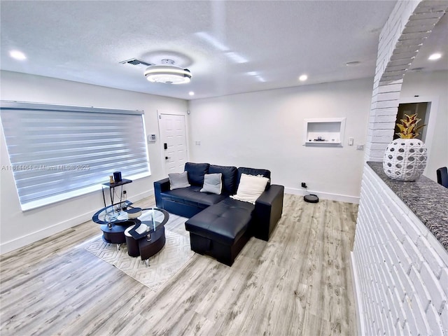 1720 SW 64th Ave, North Lauderdale, FL 33068 - living room with wood finished floors, baseboards, recessed lighting, and a textured ceiling