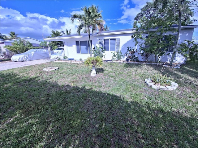 1720 SW 64th Ave, North Lauderdale, FL 33068 - ranch-style home with a front lawn, stucco siding, and driveway