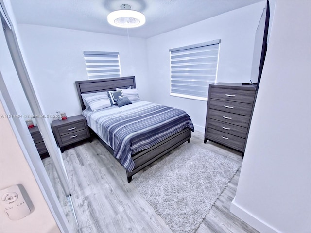 1720 SW 64th Ave, North Lauderdale, FL 33068 - bedroom featuring wood finished floors and baseboards