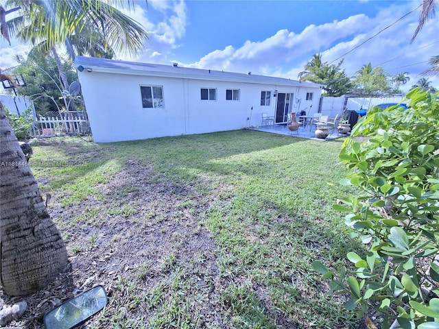 1720 SW 64th Ave, North Lauderdale, FL 33068 - rear view of property featuring a patio and stucco siding