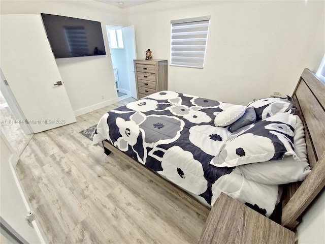 1720 SW 64th Ave, North Lauderdale, FL 33068 - bedroom with light wood-type flooring and baseboards