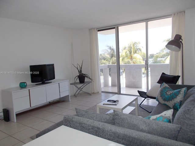 800 W Ave Unit 422, Miami Beach, FL 33139 - living area featuring light tile patterned flooring and floor to ceiling windows