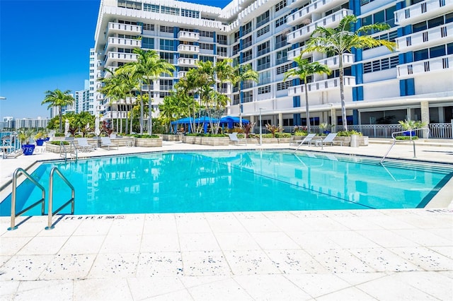 800 W Ave Unit 422, Miami Beach, FL 33139 - community pool featuring a patio area