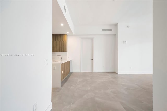 17550 Collins Unit 1604, Sunny Isles Beach, FL 33160 - hall with recessed lighting, a sink, and baseboards