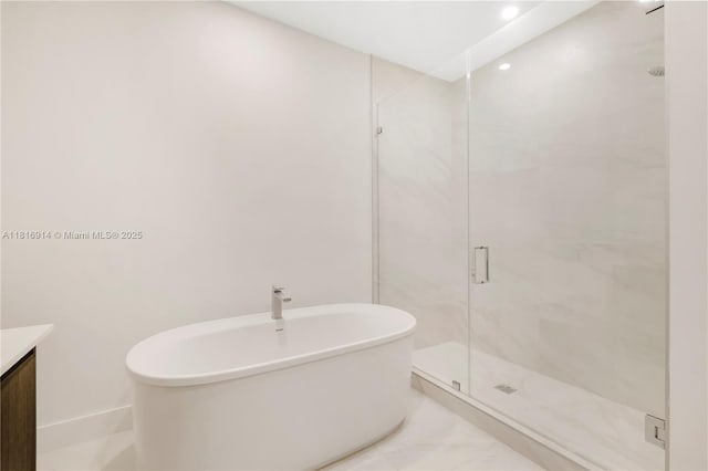 17550 Collins Unit 1604, Sunny Isles Beach, FL 33160 - full bath with a soaking tub, a marble finish shower, vanity, and recessed lighting
