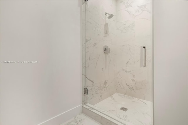 17550 Collins Unit 1604, Sunny Isles Beach, FL 33160 - bathroom with marble finish floors, a marble finish shower, and baseboards