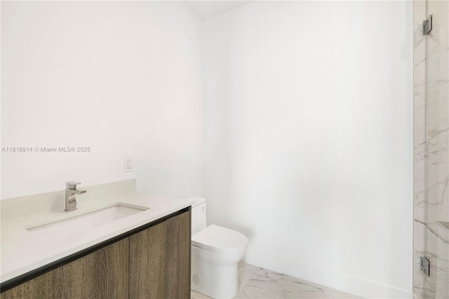17550 Collins Unit 1604, Sunny Isles Beach, FL 33160 - full bath featuring marble finish flooring, toilet, a marble finish shower, vanity, and baseboards