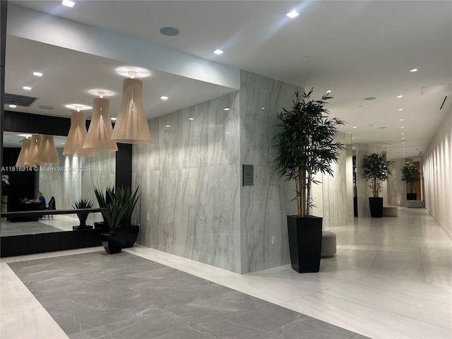 17550 Collins Unit 1604, Sunny Isles Beach, FL 33160 - building lobby with recessed lighting