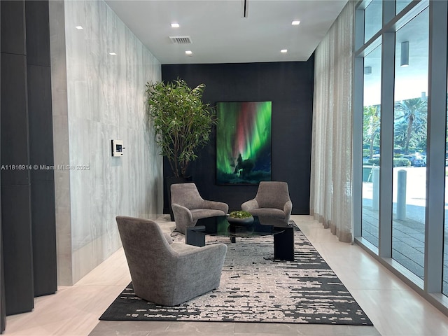 17550 Collins Unit 1604, Sunny Isles Beach, FL 33160 - community lobby featuring tile walls and recessed lighting