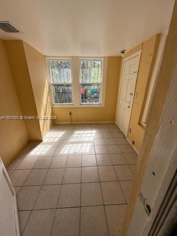 1262 SW 4th St, Miami, FL 33135 - spare room featuring light tile patterned floors