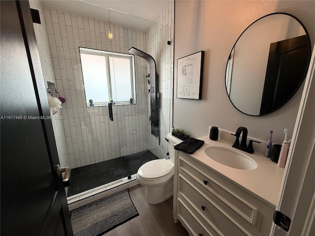 6871 SW 159th Pl, Miami, FL 33193 - bathroom with a shower stall, vanity, and wood finished floors