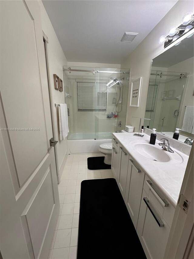 2046 NE 4th Ct, Homestead, FL 33033 - bathroom with tile patterned flooring, vanity, bathing tub / shower combination, and toilet