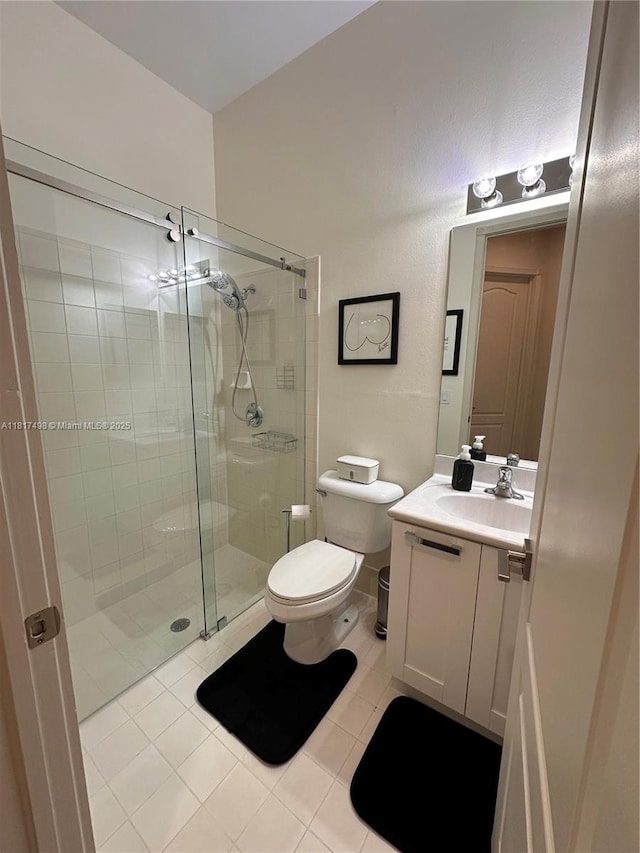 2046 NE 4th Ct, Homestead, FL 33033 - full bath featuring a stall shower, tile patterned flooring, toilet, and vanity