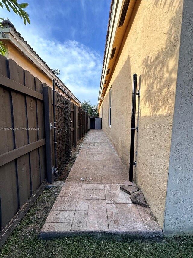 2046 NE 4th Ct, Homestead, FL 33033 - view of side of home featuring stucco siding
