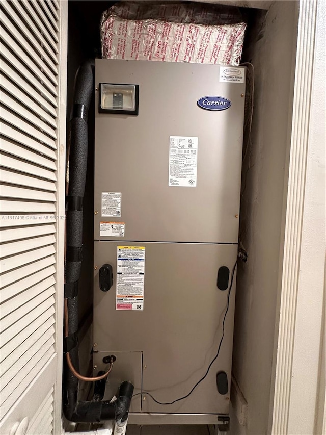 2046 NE 4th Ct, Homestead, FL 33033 - utility room featuring heating unit