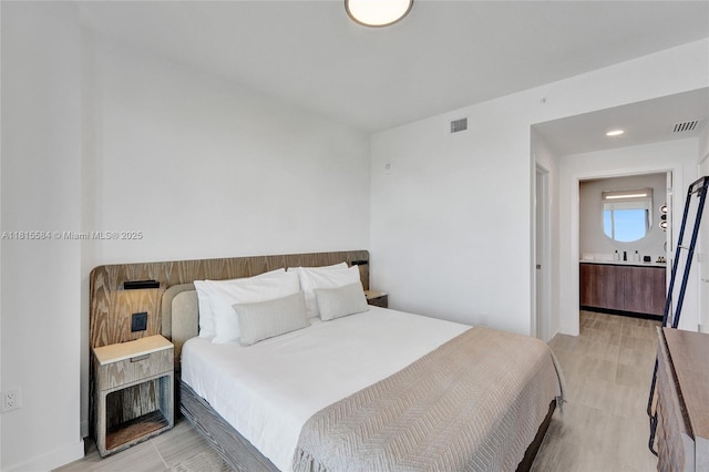 580 72nd St Unit 1712, Miami, FL 33141 - bedroom with light wood finished floors