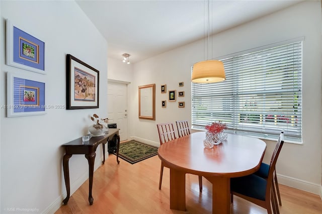 754 NE 90th St Unit 701, Miami, FL 33138 - dining space with light wood-type flooring and baseboards