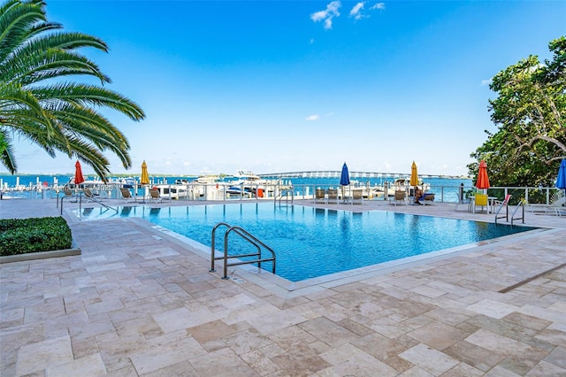 1581 Brickell Ave Unit 808, Miami, FL 33129 - community pool with a patio area