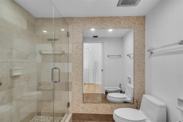 1581 Brickell Ave Unit 808, Miami, FL 33129 - full bathroom with toilet, a bidet, and a shower stall