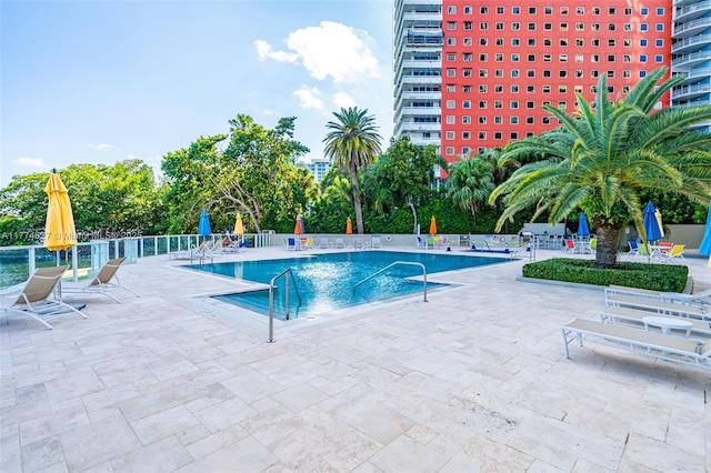 1581 Brickell Ave Unit 808, Miami, FL 33129 - community pool featuring a patio