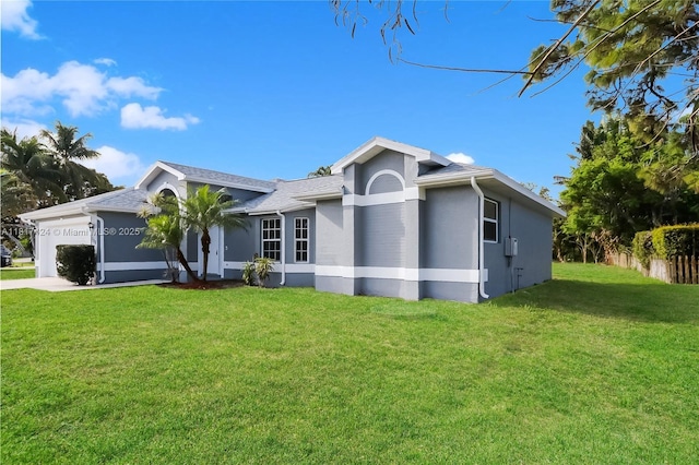 138 SW Bedford Rd, Port St Lucie, FL 34953 - single story home with a garage, stucco siding, and driveway